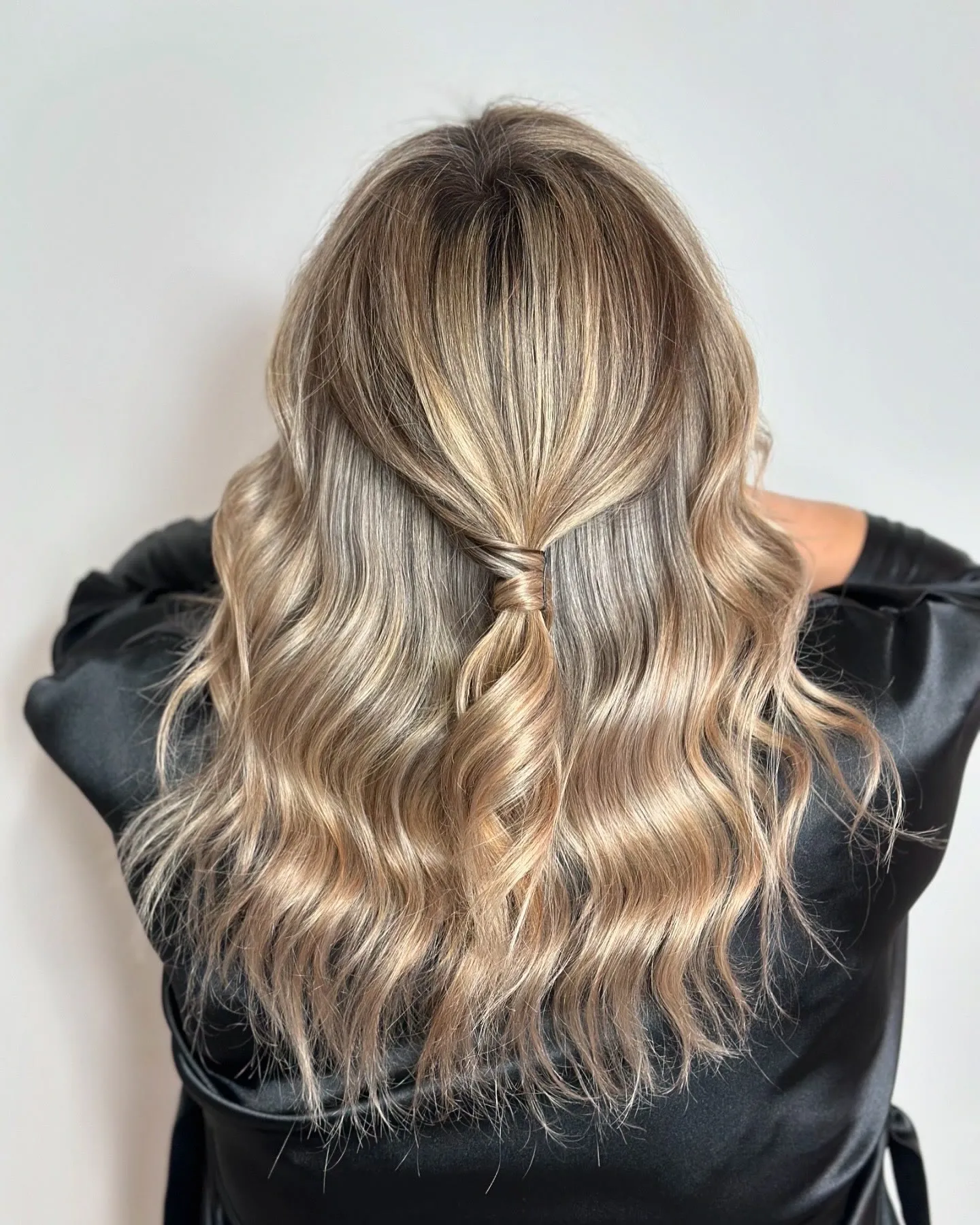 Half-up golden blonde waves by Ronak Hairstylist in Toronto